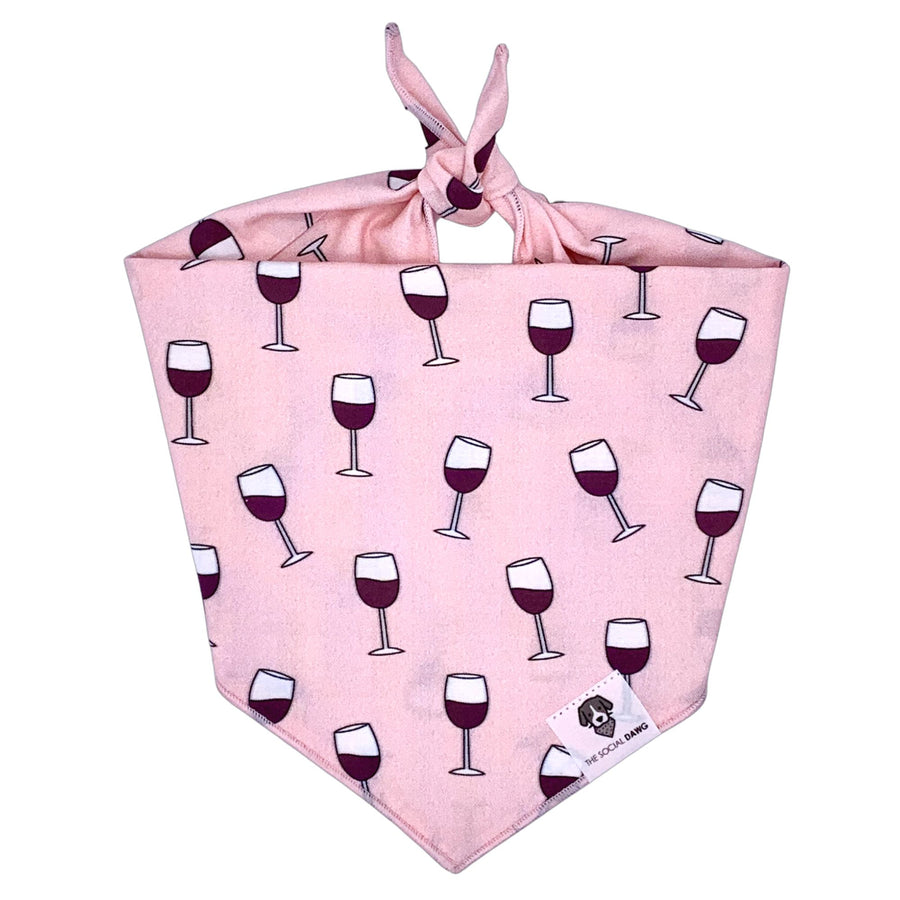 Pink bandana with red wine glasses. 