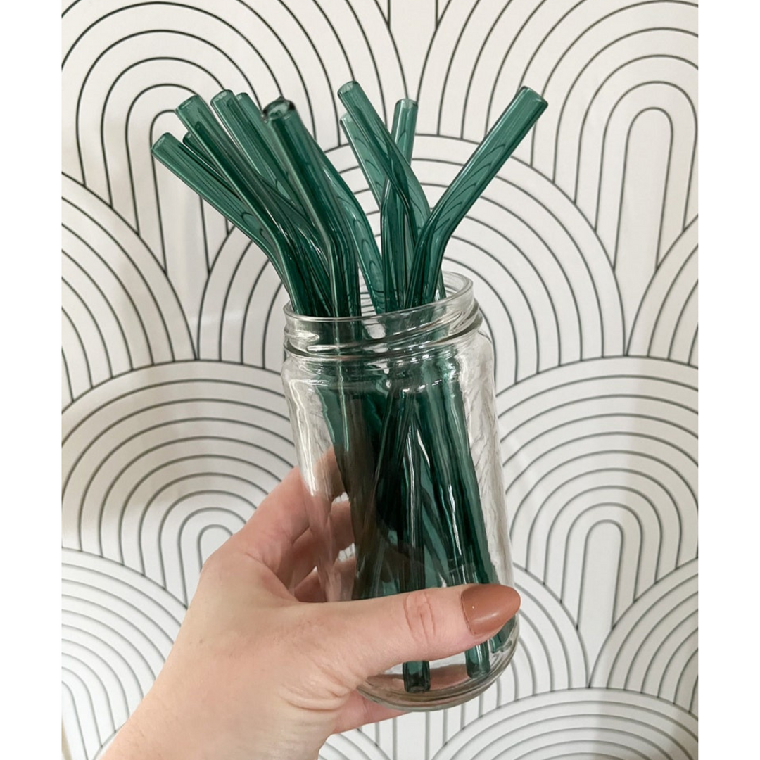 Jar with teal reusable glass drinking straws