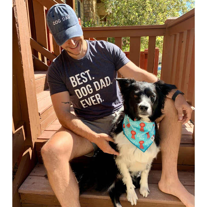 Man with Best Dog Dad Ever t-shirt petting his dog