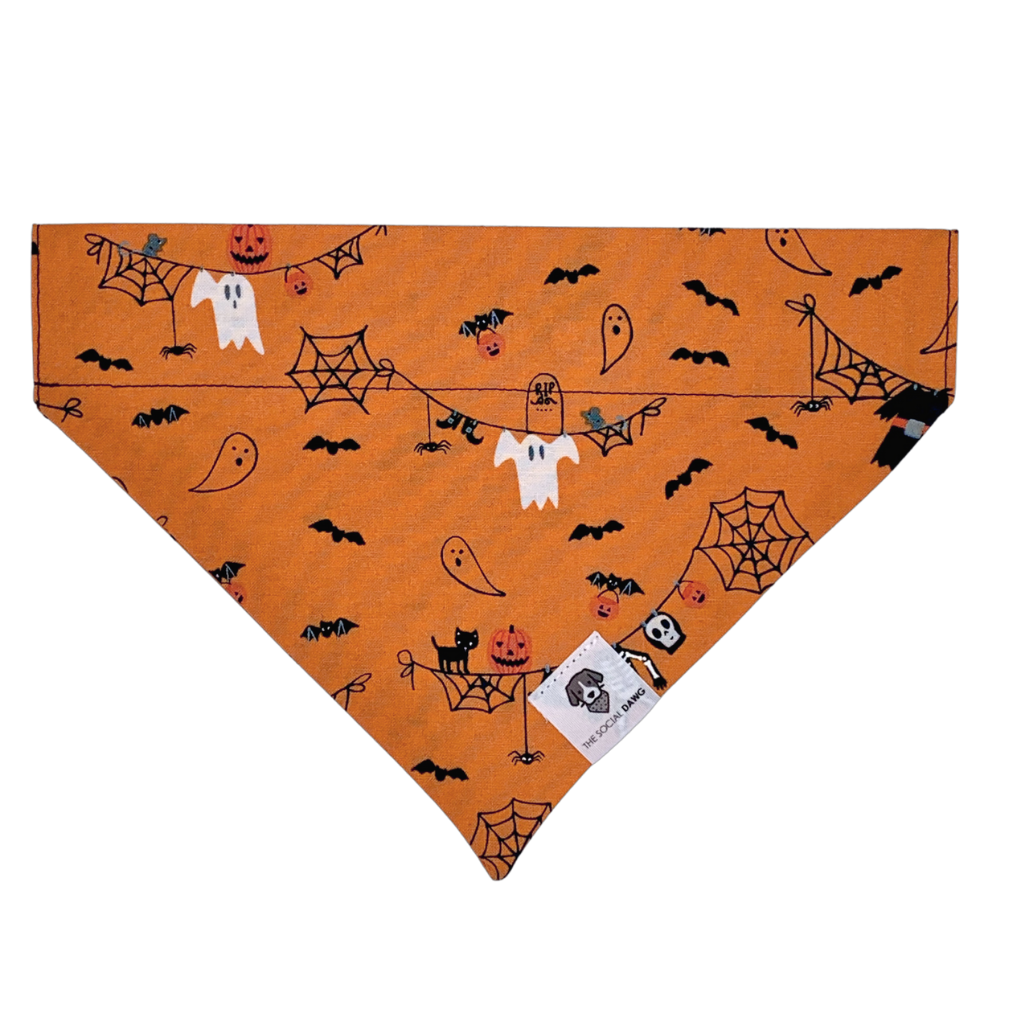 Orange Halloween ghosts and ghouls slip on dog bandana