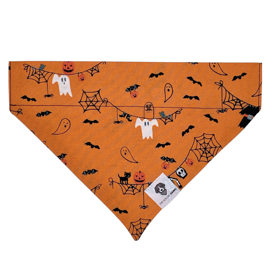 Orange Halloween ghosts and ghouls slip on dog bandana